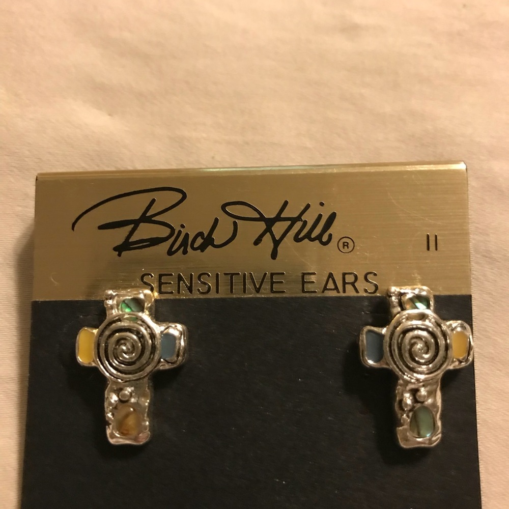Cross earrings never worn